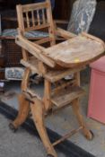 A lightwood vintage metamorphic child's chair