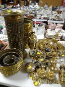 A large quantity of mixed ornamental brassware including trays and umbrella stand etc