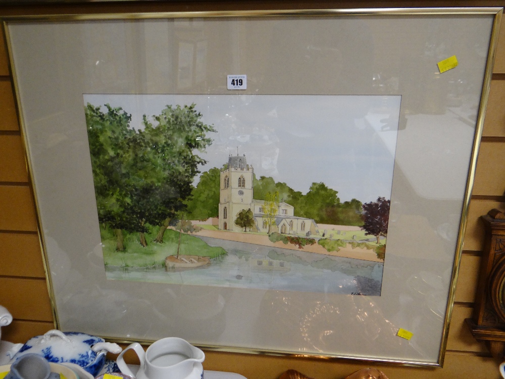 A framed watercolour of a church by a river by D J Thomas