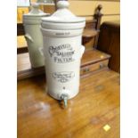 A vintage stoneware water purifier by Cheavin's