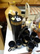 A Portmeirion Grecian key black ground coffee set and a parcel of stoneware bottles etc