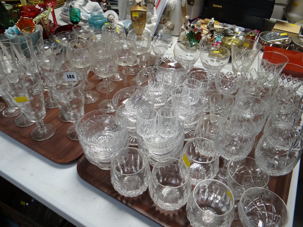 A large quantity of mixed glasses mainly for drinking including a pair of antique glass rummers
