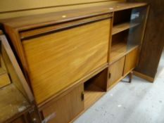 A retro Beaver & Tapley combination unit including bookcase and bureau