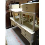 A cream painted Stag Minstrel dressing table, stool and pair of bedside tables and an antique