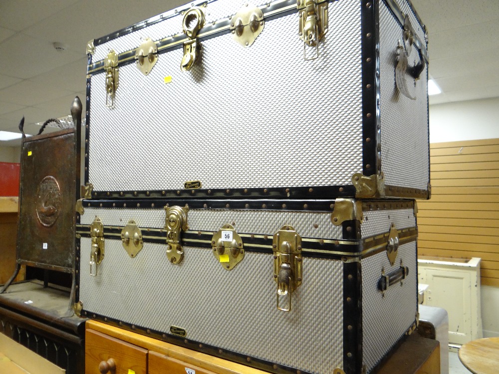 Two matching mid twentieth century Mossman cargo trunks and a boxed draughtsman's drawing board