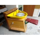 A late twentieth century potters wheel together with a large quantity of ceramic moulds and two