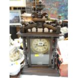 A Black Forest-style mantel clock