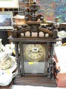 A Black Forest-style mantel clock