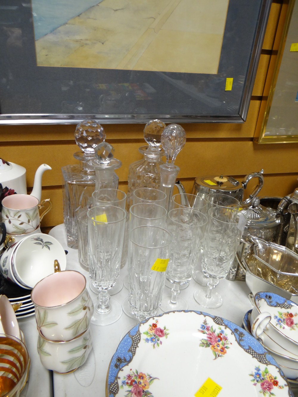 Four cut glass decanters and sundry wine glasses