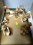 Seven Hummel figurines