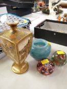 Two items of art glass, two glass paperweights and a Satsuma thousand faces-style pottery, faceted
