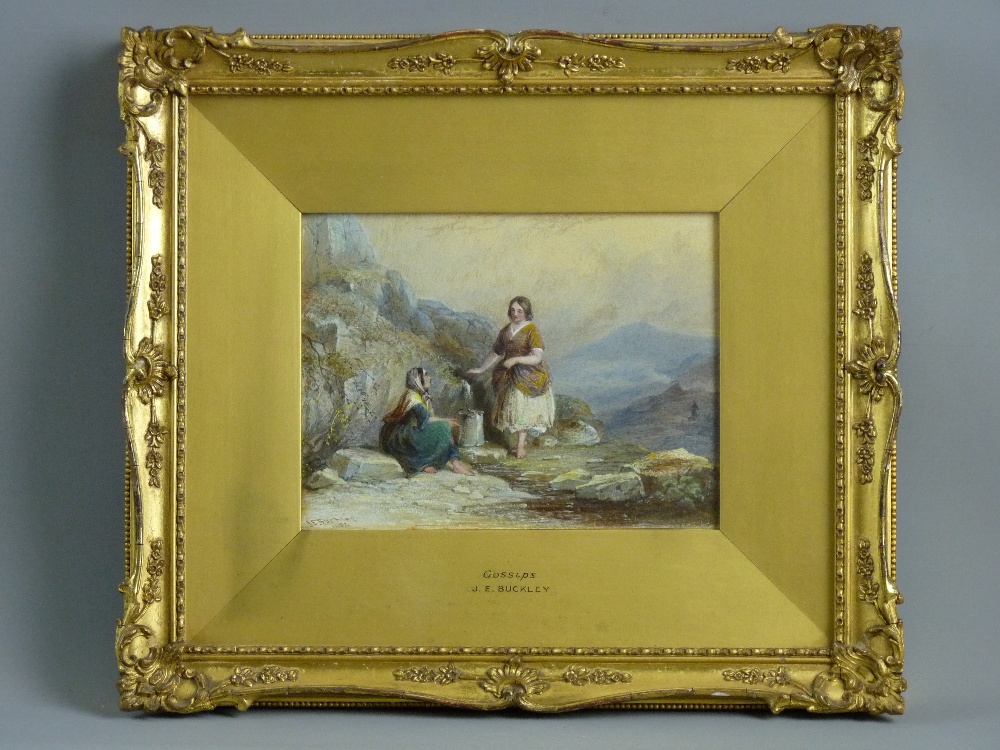 J E BUCKLEY watercolour - two figures with water pitcher at a well in a landscape setting, signed