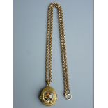 A NINE CARAT GOLD MUFF CHAIN with a yellow metal oval locket, the lid having a horseshoe with enamel