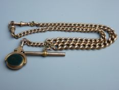 A NINE CARAT GOLD DOUBLE ALBERT with two swivels, T-bar and bloodstone and agate swivel fob (