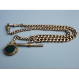 A NINE CARAT GOLD DOUBLE ALBERT with two swivels, T-bar and bloodstone and agate swivel fob (