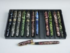 A COLLECTION OF TWELVE VINTAGE MARBLE PATTERN FOUNTAIN PENS to include a Conway Stewart 27, an