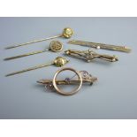 TWO GOLD BAR BROOCHES and another dart and circle brooch, believed gold, total 5.2 grms, a yellow