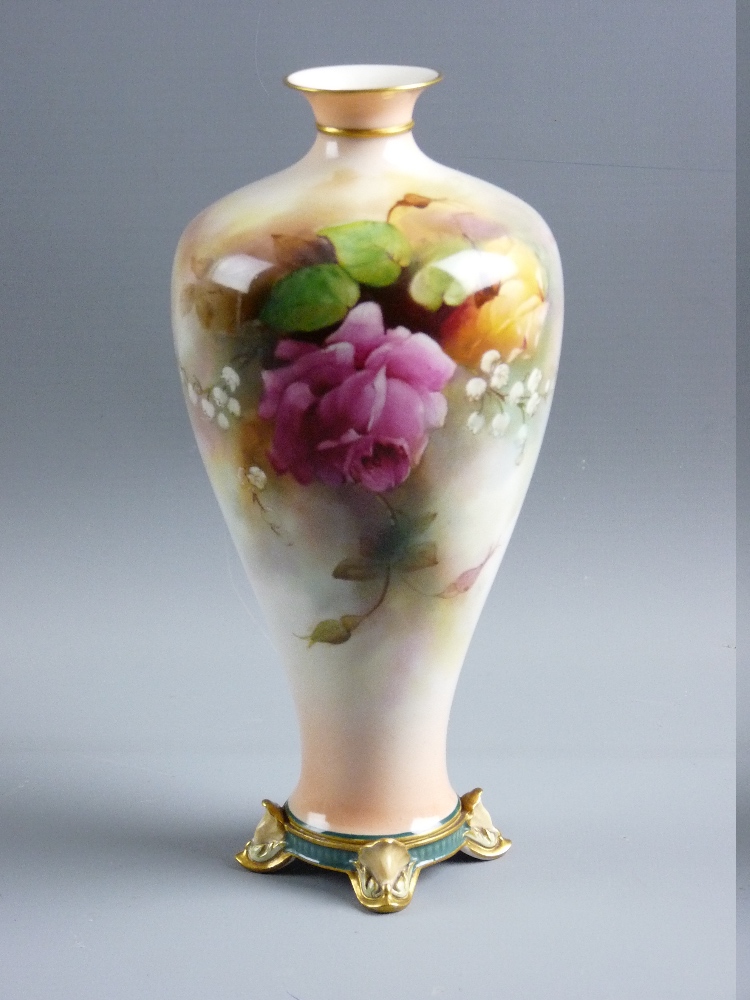 A ROYAL WORCESTER HAND PAINTED BALUSTER VASE by R Austin, having a gilt rim and neck band over a