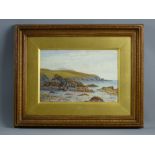 ROBERT DOBSON watercolour - rocky coastalscape with two figures, signed and dated 1897, 18 x 27 cms