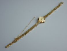 A NINE CARAT GOLD ROLEX TUDOR ROYAL LADY'S WATCH on bracelet strap, 14.5 grms gross, inscribed to