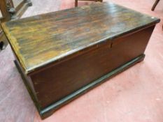 AN ANTIQUE STAINED PINE BOX with interior candle box, 37 cms high, 93.5 cms wide, 50.5 cms deep