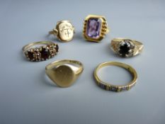 A PARCEL OF FIVE WELL DRESSED NINE CARAT GOLD RINGS and a half hoop eternity ring, total 27 grms