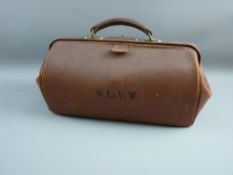 A VINTAGE GLADSTONE BAG stamped with the letters 'S L E V W', 50 cms across