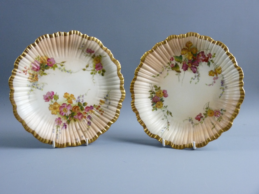 A PAIR OF ROYAL WORCESTER 1416 PATTERN CIRCULAR PLATES with rib pattern and wavy borders with gilt