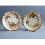 A PAIR OF ROYAL WORCESTER 1416 PATTERN CIRCULAR PLATES with rib pattern and wavy borders with gilt