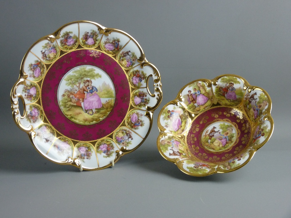 TWO KARLSBADER CHINA DESSERT PIECES with floral and figural decoration - an oval plate and a