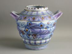 A CHARLOTTE RHEAD FOR CROWN DUCAL TWIN HANDLED VASE, tube line decorated in purple tones on a ribbed