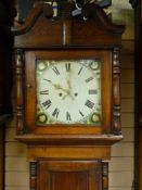 A GEORGE III OAK LONGCASE CLOCK, the 14 ins square dial set with Roman numerals, subsidiary