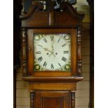A GEORGE III OAK LONGCASE CLOCK, the 14 ins square dial set with Roman numerals, subsidiary