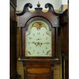 A GEORGE III MAHOGANY LONGCASE CLOCK by Jones, Beaumaris with rolling moon movement, the dial set