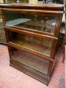 A GLOBE WERNICKE THREE STACK MAHOGANY BOOKCASE with shaped top and base section, 120 cms high, 87