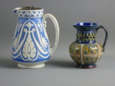 A COPELAND BLUE GROUND SEMI-GLAZED NARROW NECK JUG with raised Gothic style pattern, scrolled handle