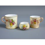 THREE ROYAL WORCESTER CABINET PIECES with handpainted floral patterns on a blush ground including