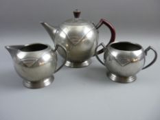 A WARRIC ART DECO THREE PIECE PEWTER TEASET, bullet shaped teapot with bakelite handle and finial