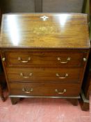 AN EDWARDIAN INLAID MAHOGANY FALL FRONT BUREAU with crossbanded edges and floral inlaid front