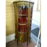 A REPRODUCTION VERNIS MARTIN STYLE DISPLAY CABINET having a central bow glass door and side panels