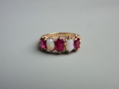 A FIFTEEN CARAT GOLD RUBY (three) & OPAL (two) DRESS RING, all oval cut stones, size 'O/P', 4.5