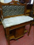 A VICTORIAN SCUMBLED PINE TILED BACK WASHSTAND with white marble top, 122 cms high overall, 92 cms