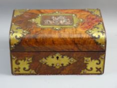 A VICTORIAN WALNUT LIDDED BOX with Gothic style brass mounts and copper top panel showing three