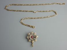 A NINE CARAT GOLD CHAIN with a pearl and ruby set pendant, 46 cms long the chain, 8.5 grms, the