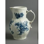 A WORCESTER CABBAGE LEAF MOULDED MASK JUG, circa 1770, decorated in the 'Three Flowers' pattern with