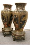 A RARE & EXCEPTIONALLY LARGE PAIR OF CHINESE LACQUERWORK VASES on stands, the black lacquered