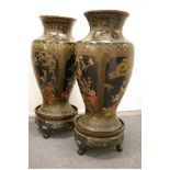 A RARE & EXCEPTIONALLY LARGE PAIR OF CHINESE LACQUERWORK VASES on stands, the black lacquered