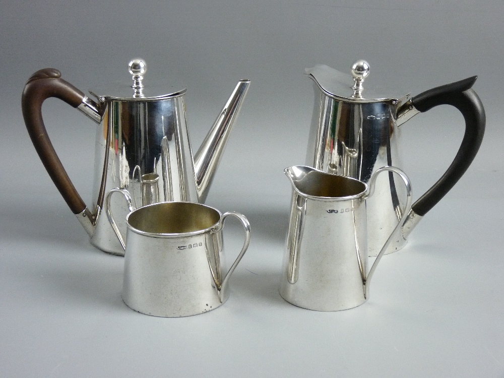 A 1930's FOUR PIECE HALLMARKED SILVER COFFEE SET of plain form, Birmingham 1932, 26 troy ozs