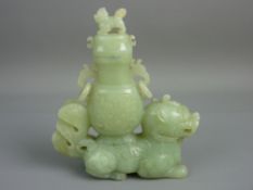 AN EARLY 20th CENTURY CHINESE CELADON JADE DRAGON CENSER, the cover with Dog of Fo figure (handle