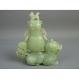 AN EARLY 20th CENTURY CHINESE CELADON JADE DRAGON CENSER, the cover with Dog of Fo figure (handle